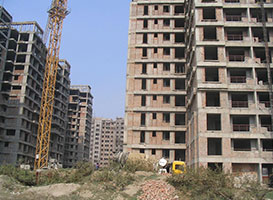 GST on under-construction housing properties cut to 5%, affordable houses to 1%